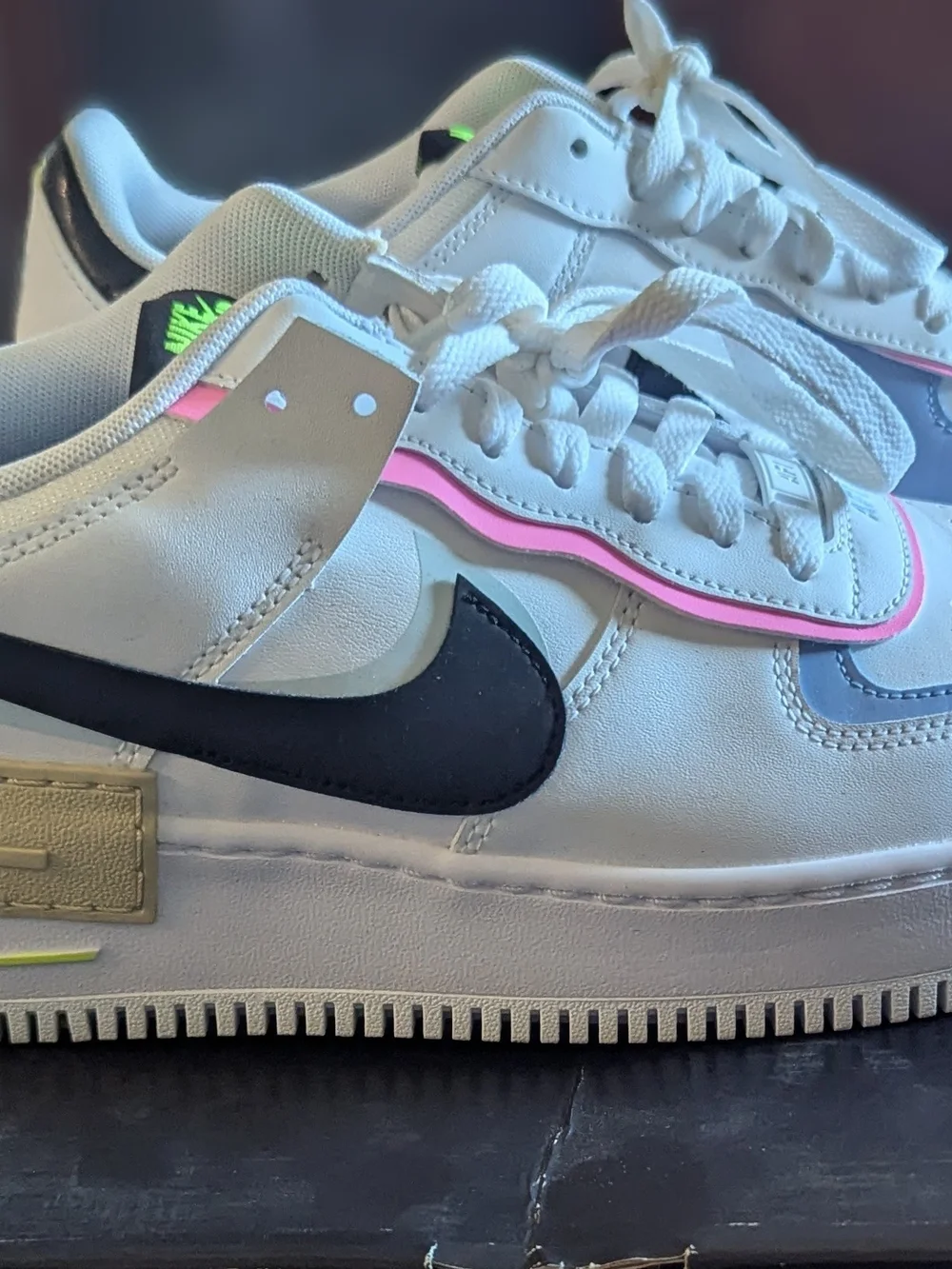 Nike women's White Sneakers with Black Swoosh and Pink Trim